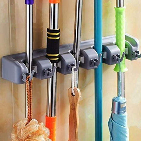 Wall Mounted Broom Holder being used